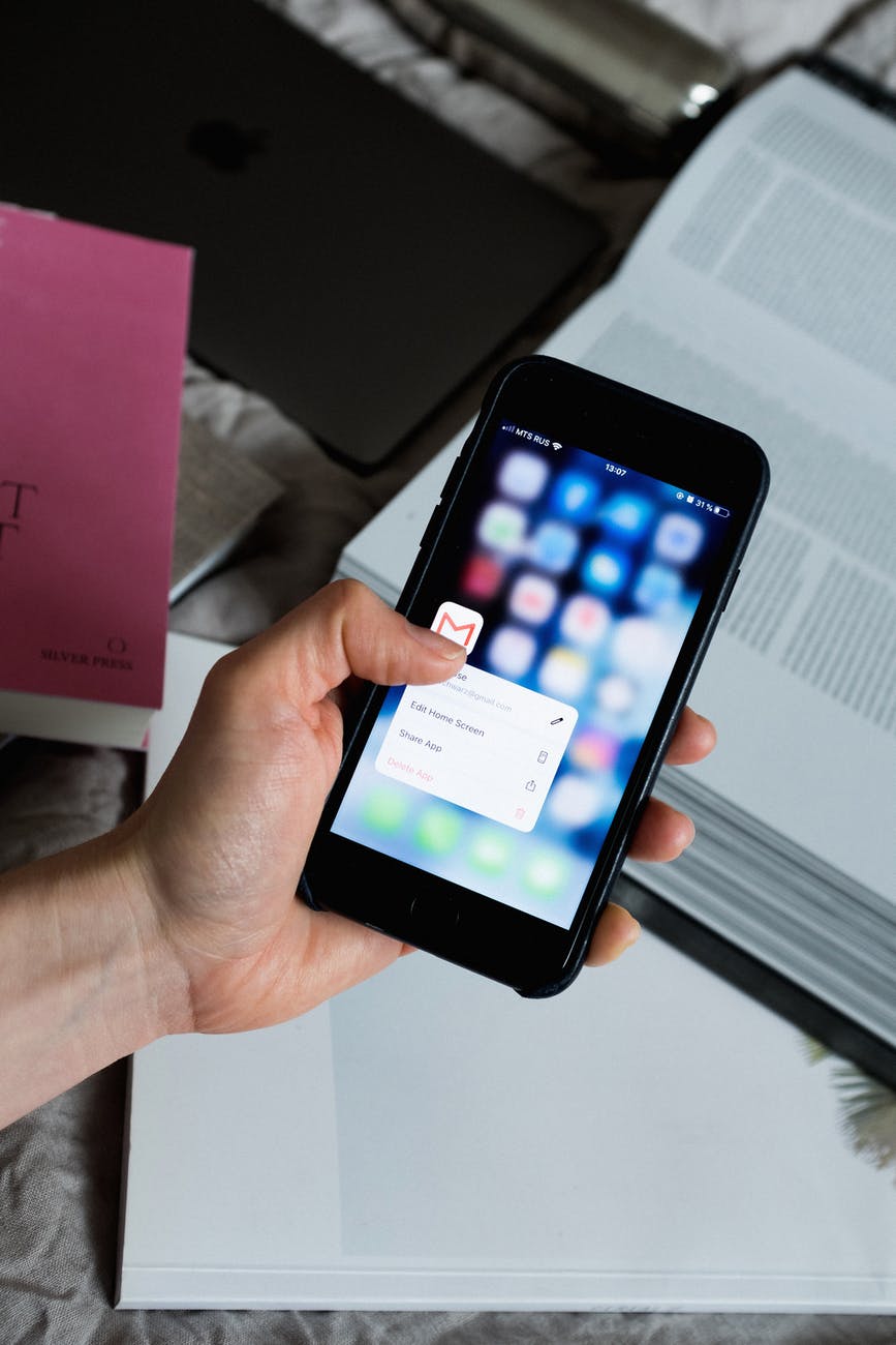 person holding black smartphone